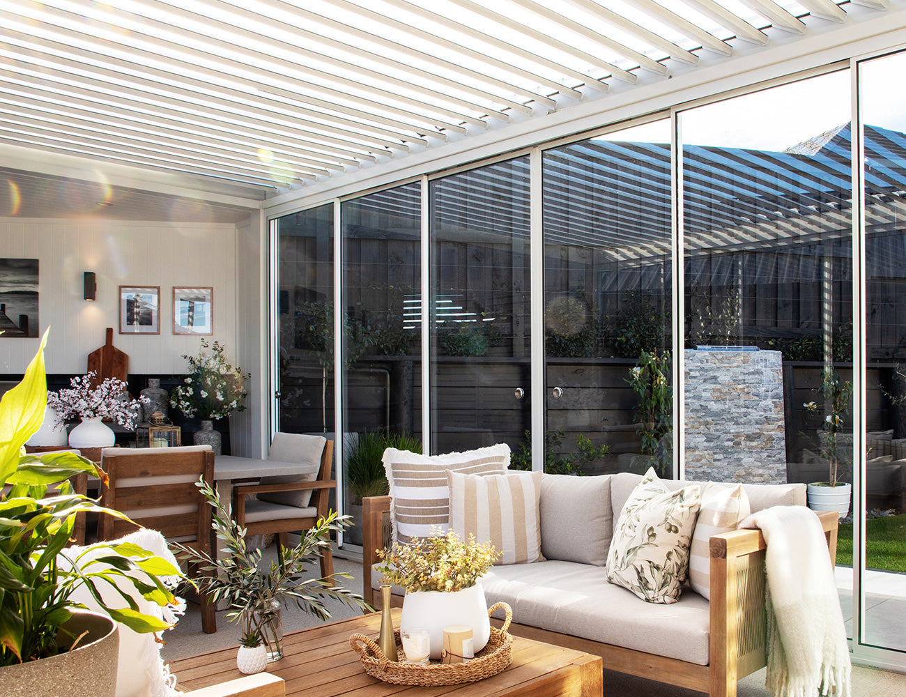 Tasman Motorised Wall Mounted Louvre Roof Aluminium Pergola Size: 4 x 3.8m Colour: Black